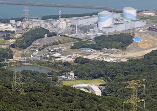 Japan resumes supplying nuclear power 2 years after Fukushima disaster - ảnh 1